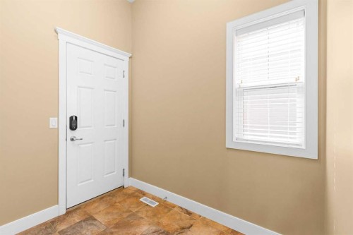 117 Kingsland Court Se, Airdrie, AB - Indoor Photo Showing Other Room