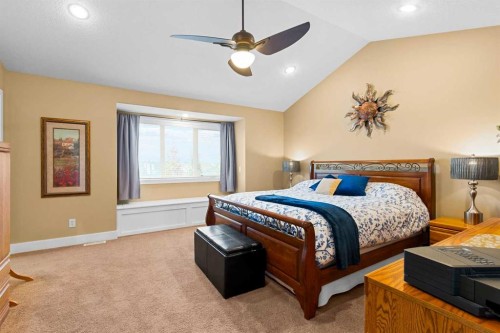 117 Kingsland Court Se, Airdrie, AB - Indoor Photo Showing Bedroom