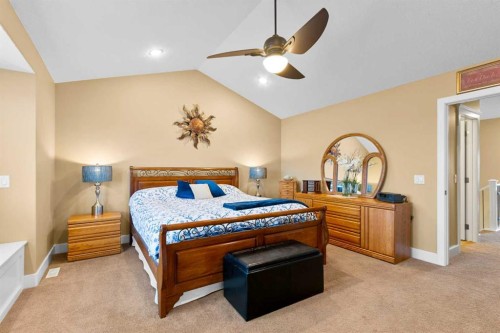 117 Kingsland Court Se, Airdrie, AB - Indoor Photo Showing Bedroom