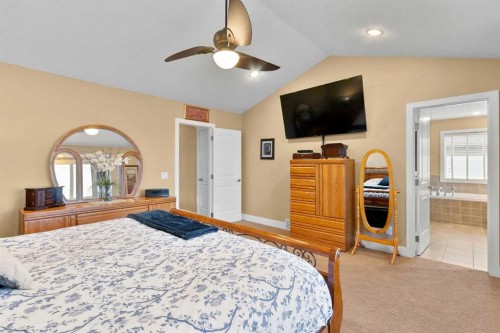 117 Kingsland Court Se, Airdrie, AB - Indoor Photo Showing Bedroom