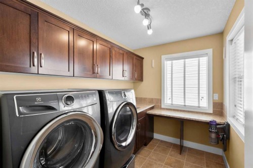 117 Kingsland Court Se, Airdrie, AB - Indoor Photo Showing Laundry Room