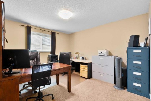 117 Kingsland Court Se, Airdrie, AB - Indoor Photo Showing Office