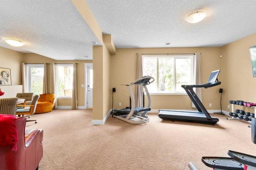 117 Kingsland Court Se, Airdrie, AB - Indoor Photo Showing Gym Room
