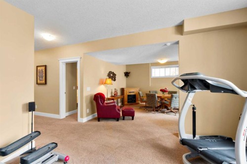 117 Kingsland Court Se, Airdrie, AB - Indoor Photo Showing Gym Room