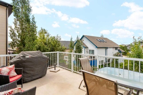 117 Kingsland Court Se, Airdrie, AB - Outdoor With Deck Patio Veranda With Exterior