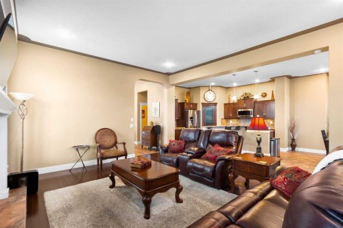 117 Kingsland Court Se, Airdrie, AB - Indoor Photo Showing Living Room