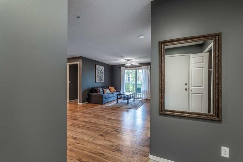 8213-304 Mackenzie Way Sw, Airdrie, AB - Indoor Photo Showing Other Room