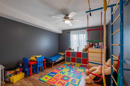 8213-304 Mackenzie Way Sw, Airdrie, AB - Indoor