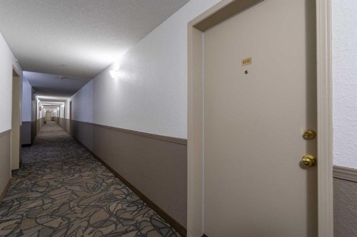 8213-304 Mackenzie Way Sw, Airdrie, AB - Indoor Photo Showing Other Room