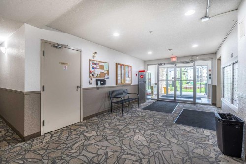 8213-304 Mackenzie Way Sw, Airdrie, AB - Indoor Photo Showing Other Room