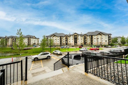 8213-304 Mackenzie Way Sw, Airdrie, AB - Outdoor