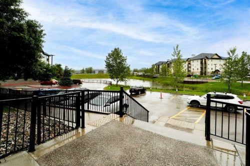8213-304 Mackenzie Way Sw, Airdrie, AB - Outdoor