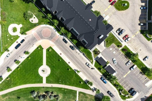 8213-304 Mackenzie Way Sw, Airdrie, AB - 