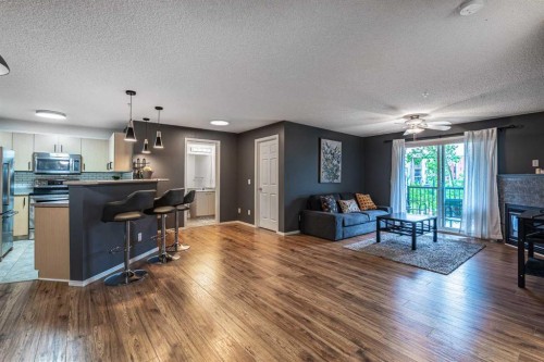 8213-304 Mackenzie Way Sw, Airdrie, AB - Indoor