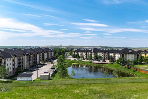 8213-304 Mackenzie Way Sw, Airdrie, AB - Outdoor With View