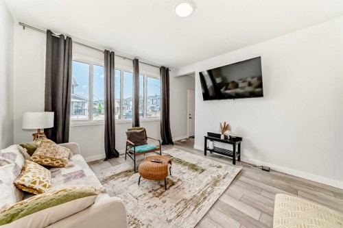 144 Evanscrest Park Nw, Calgary, AB - Indoor Photo Showing Living Room
