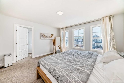 144 Evanscrest Park Nw, Calgary, AB - Indoor Photo Showing Bedroom