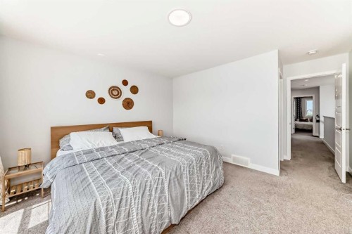 144 Evanscrest Park Nw, Calgary, AB - Indoor Photo Showing Bedroom