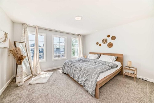 144 Evanscrest Park Nw, Calgary, AB - Indoor Photo Showing Bedroom