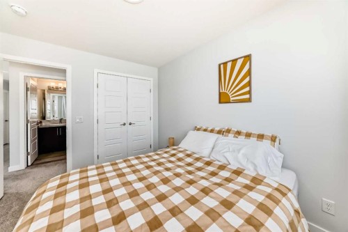 144 Evanscrest Park Nw, Calgary, AB - Indoor Photo Showing Bedroom