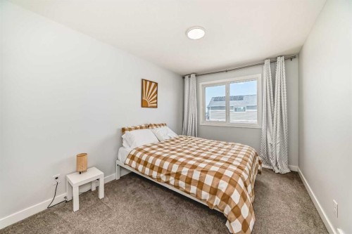 144 Evanscrest Park Nw, Calgary, AB - Indoor Photo Showing Bedroom