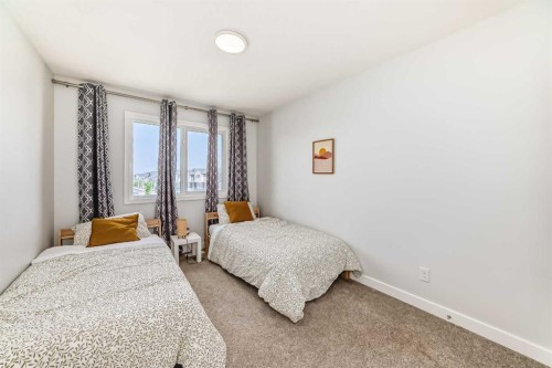 144 Evanscrest Park Nw, Calgary, AB - Indoor Photo Showing Bedroom