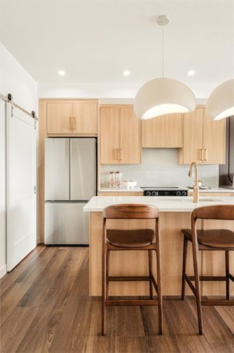 118-20 Cascade Ridge, Canmore, AB - Indoor Photo Showing Kitchen With Double Sink
