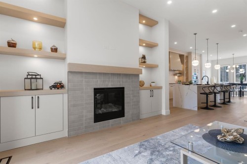 3110 40 Street Sw, Calgary, AB - Indoor Photo Showing Living Room With Fireplace