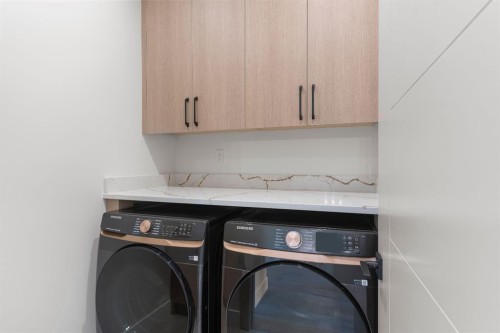 3110 40 Street Sw, Calgary, AB - Indoor Photo Showing Laundry Room