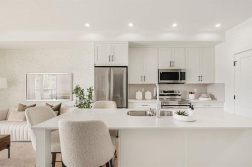 119-20 Cascade Ridge, Canmore, AB - Indoor Photo Showing Kitchen With Double Sink With Upgraded Kitchen