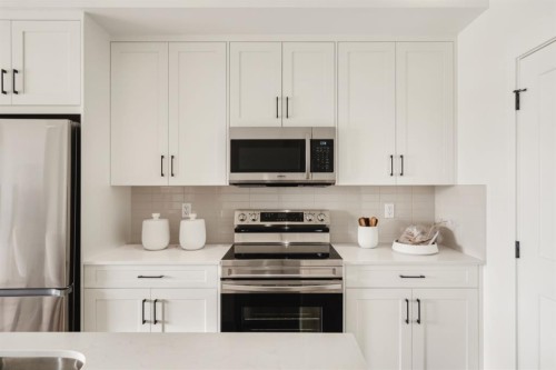 119-20 Cascade Ridge, Canmore, AB - Indoor Photo Showing Kitchen