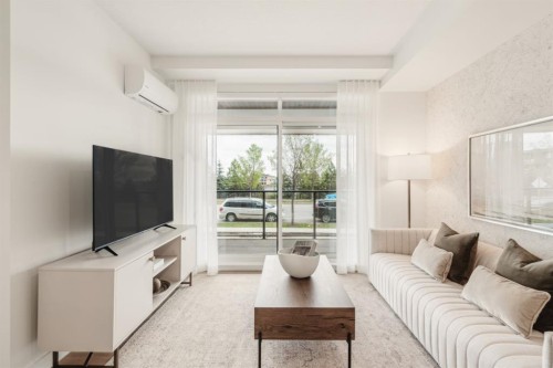 119-20 Cascade Ridge, Canmore, AB - Indoor Photo Showing Living Room