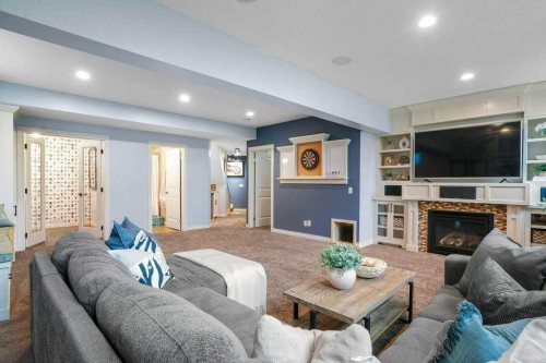 127 Hillcrest Boulevard, Strathmore, AB - Indoor Photo Showing Living Room With Fireplace