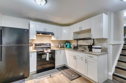 411 Rundleson Place Ne, Calgary, AB - Indoor Photo Showing Kitchen