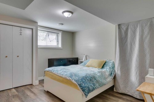 411 Rundleson Place Ne, Calgary, AB - Indoor Photo Showing Bedroom