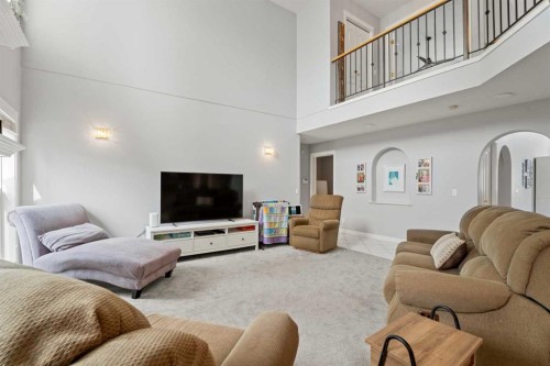 857 West Chesteremere Drive, Chestermere, AB - Indoor Photo Showing Living Room