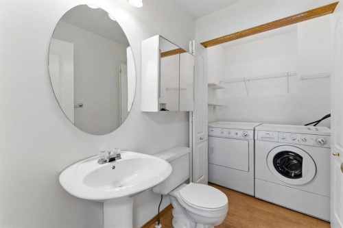 34 Tuscarora Way Nw, Calgary, AB - Indoor Photo Showing Laundry Room