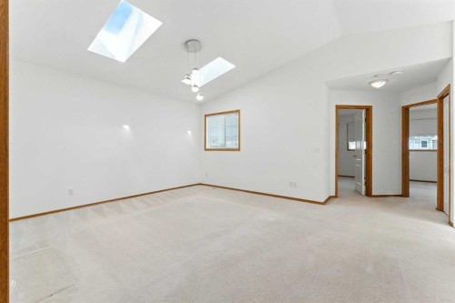 34 Tuscarora Way Nw, Calgary, AB - Indoor Photo Showing Other Room