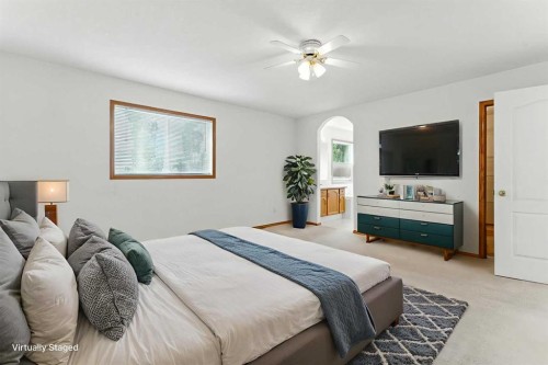 34 Tuscarora Way Nw, Calgary, AB - Indoor Photo Showing Bedroom