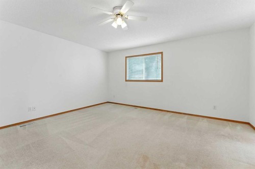 34 Tuscarora Way Nw, Calgary, AB - Indoor Photo Showing Other Room