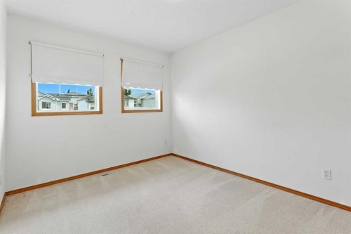 34 Tuscarora Way Nw, Calgary, AB - Indoor Photo Showing Other Room