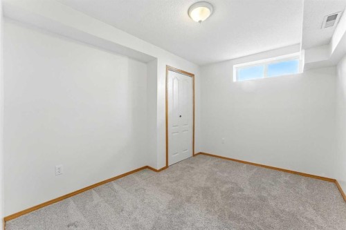 34 Tuscarora Way Nw, Calgary, AB - Indoor Photo Showing Other Room