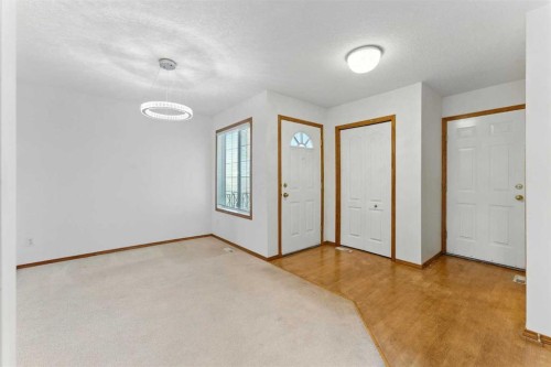 34 Tuscarora Way Nw, Calgary, AB - Indoor Photo Showing Other Room