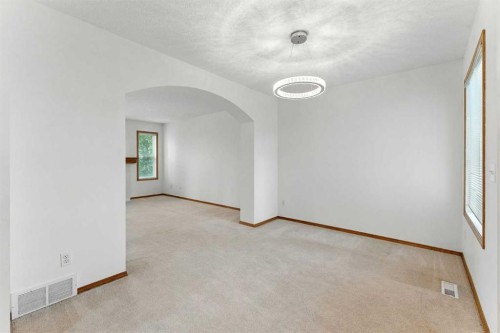 34 Tuscarora Way Nw, Calgary, AB - Indoor Photo Showing Other Room