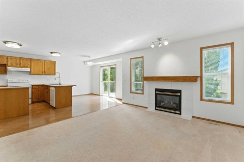 34 Tuscarora Way Nw, Calgary, AB - Indoor With Fireplace