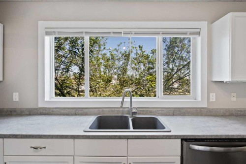 120 Prestwick Acres Lane Se, Calgary, AB - Indoor Photo Showing Kitchen With Double Sink