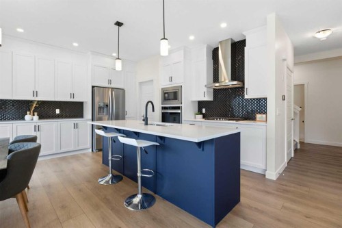 1635 Baywater Street Sw, Airdrie, AB - Indoor Photo Showing Kitchen With Upgraded Kitchen