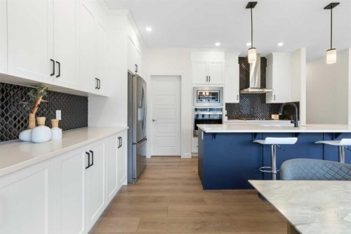 1635 Baywater Street Sw, Airdrie, AB - Indoor Photo Showing Kitchen With Upgraded Kitchen