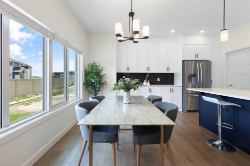 1635 Baywater Street Sw, Airdrie, AB - Indoor Photo Showing Kitchen With Upgraded Kitchen