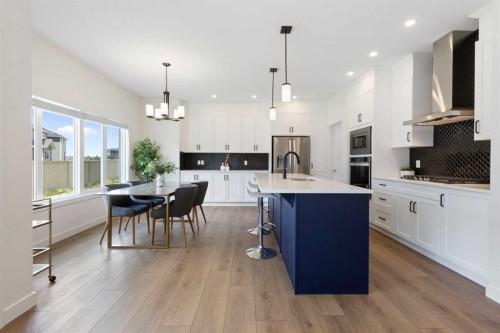 1635 Baywater Street Sw, Airdrie, AB - Indoor Photo Showing Kitchen With Upgraded Kitchen